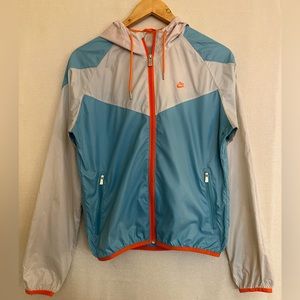 Nike Nylon light breathable rain Jacket in grey, light blue & high light orange.